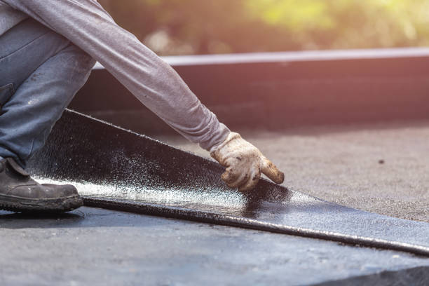 Professional Waterproofing technician working in Whitleyville, TN